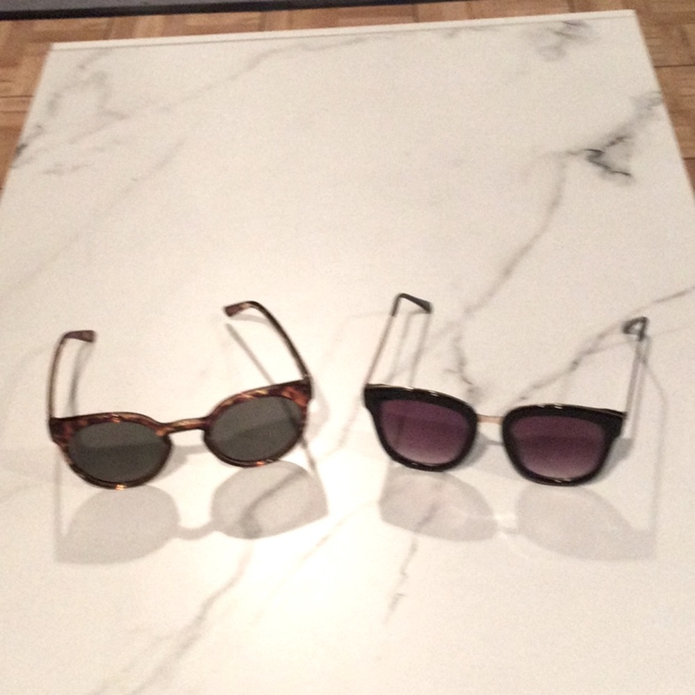 Set of two cats eye sunglasses, one tortoise, one black.